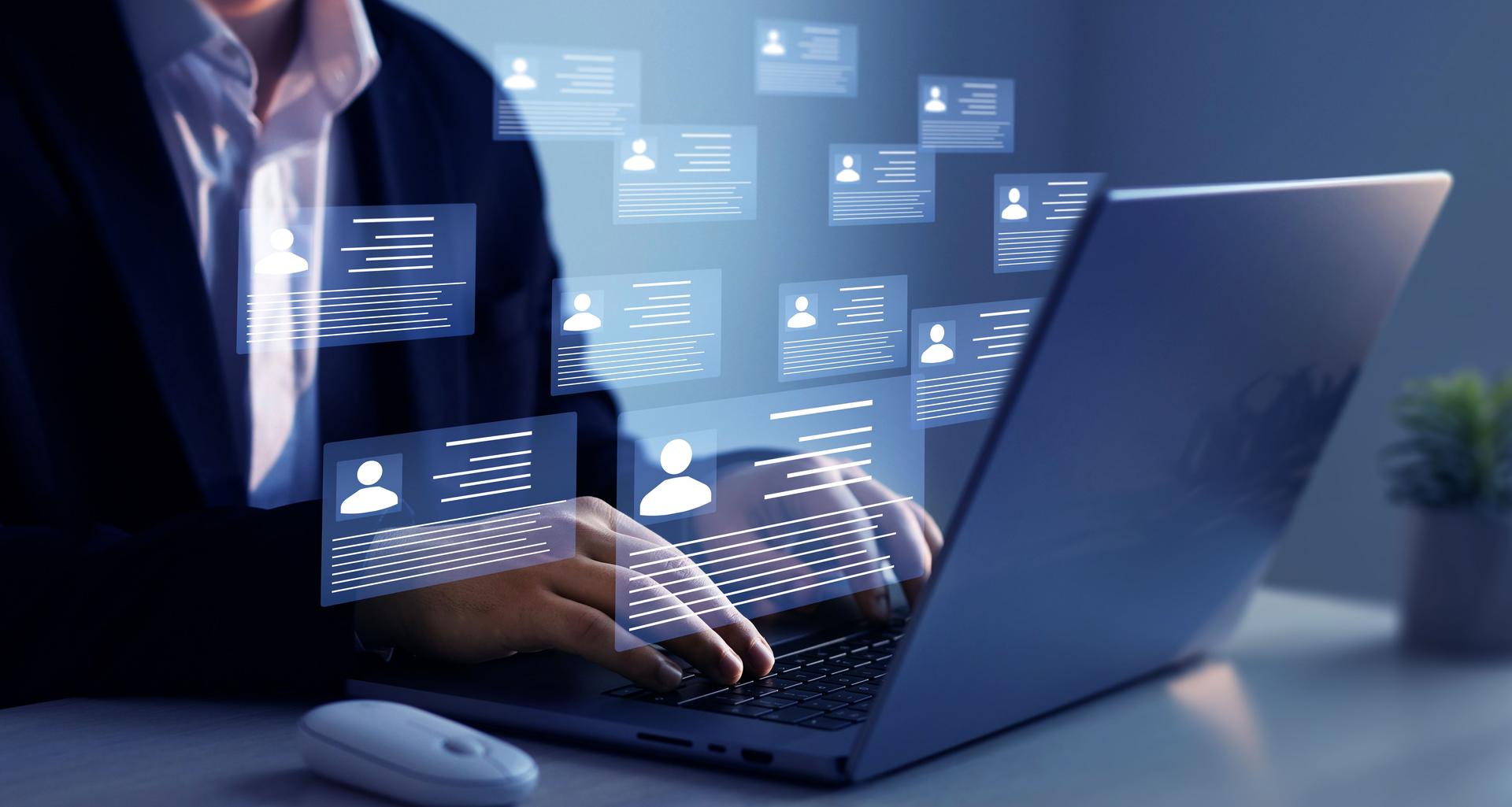 Online technology for simplifying human resources system management.Human resource manager checks  CV online to choose perfect employee for his business work.